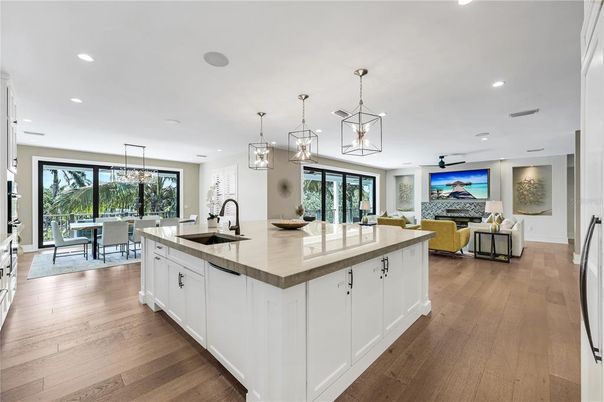 Dining room, Fireplace, Interior, Kitchen, Living room, Pendant Lights, Recessed Lighting, Wood Texture Flooring