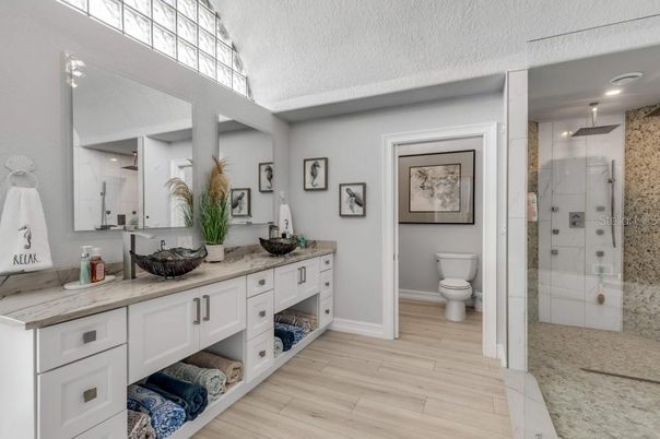 Bathroom, Dual Sink Vanities, Glass Shower, Interior, Wood Texture Flooring