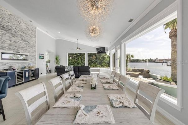 Dining room, Interior, Pendant Lights, Recessed Lighting, Stone Walls, Water, Wood Texture Flooring
