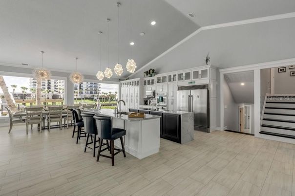 Dining room, Interior, Kitchen, Pendant Lights, Recessed Lighting, Stainless Steel Appliances, Wood Texture Flooring