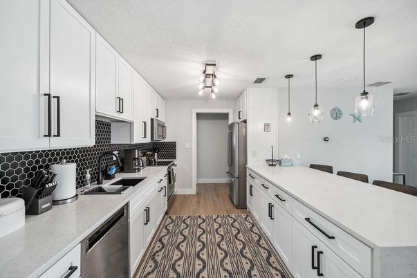 Interior, Kitchen, Pendant Lights, Stainless Steel Appliances, Wood Texture Flooring