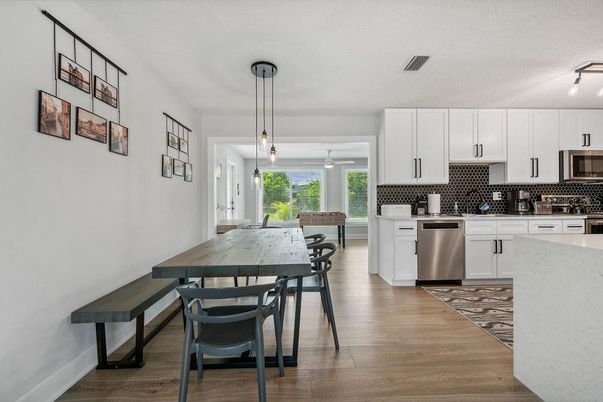 Dining room, Interior, Kitchen, Pendant Lights, Stainless Steel Appliances, Wood Texture Flooring