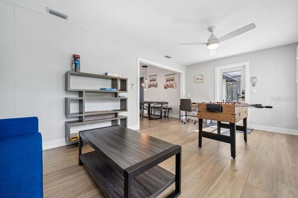 Dining room, Game Room, Interior, Pendant Lights, Wood Texture Flooring