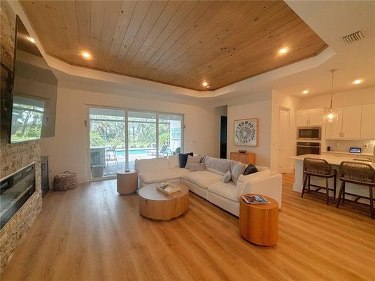 Fireplace, Interior, Kitchen, Living room, Pendant Lights, Recessed Lighting, Stone Walls, Wooden Ceilings, Wood Texture Flooring