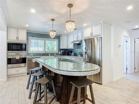 Interior, Kitchen, Pendant Lights, Recessed Lighting, Stainless Steel Appliances, Wood Texture Flooring
