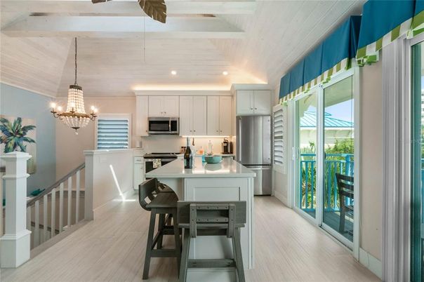 Chandelier, Interior, Kitchen, Recessed Lighting, Stainless Steel Appliances, Wood Texture Flooring