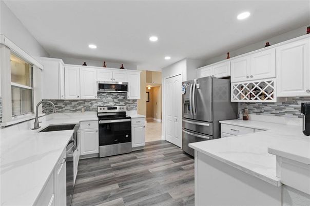 Interior, Kitchen, Recessed Lighting, Stainless Steel Appliances, Wood Texture Flooring
