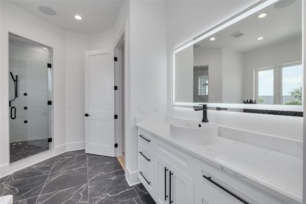Bathroom, Dual Sink Vanities, Glass Shower, Interior, Marble, Recessed Lighting
