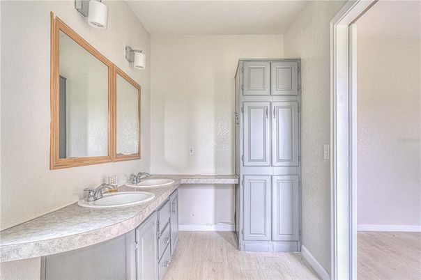 Bathroom, Dual Sink Vanities, Interior, Tile Countertops, Wood Texture Flooring