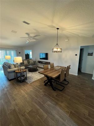 Dining room, Interior, Living room, Pendant Lights, Wood Texture Flooring