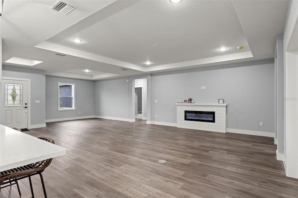 Empty room, Fireplace, Interior, Recessed Lighting, Wood Texture Flooring