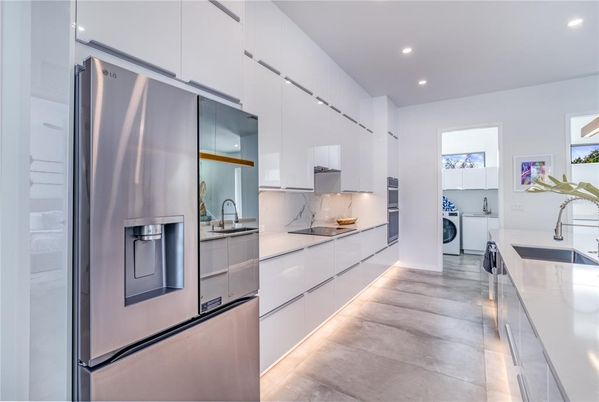 Interior, Kitchen, Recessed Lighting, Stainless Steel Appliances, Washer, Wood Texture Flooring