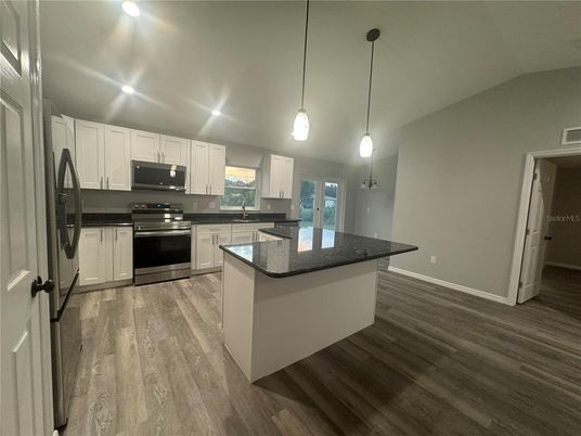 Interior, Kitchen, Pendant Lights, Recessed Lighting, Stainless Steel Appliances, Wood Texture Flooring