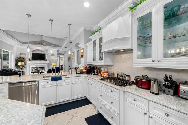 Fireplace, Interior, Kitchen, Pendant Lights, Recessed Lighting, Stainless Steel Appliances