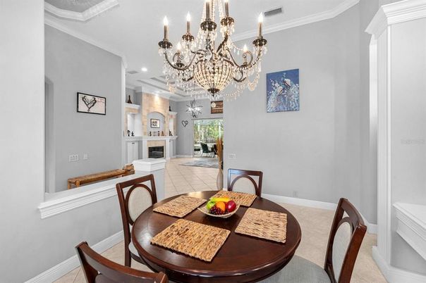 Chandelier, Dining room, Fireplace, Interior, Recessed Lighting