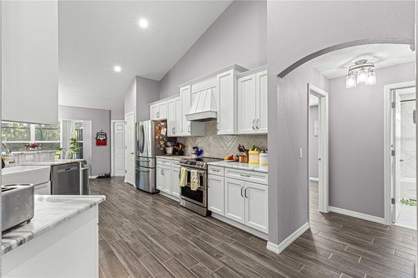 Interior, Kitchen, Recessed Lighting, Stainless Steel Appliances, Wood Texture Flooring