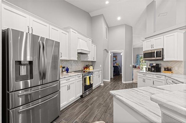 Interior, Kitchen, Recessed Lighting, Stainless Steel Appliances, Wood Texture Flooring