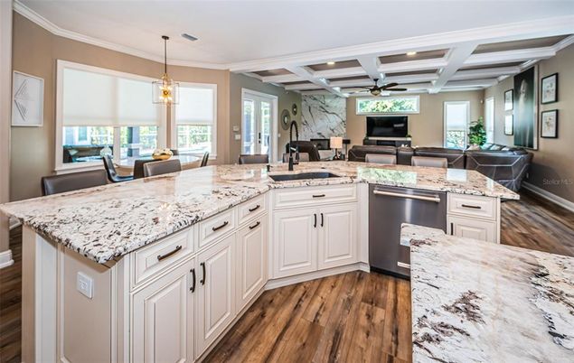 Dining room, Interior, Kitchen, Pendant Lights, Recessed Lighting, Stainless Steel Appliances, Wood Texture Flooring