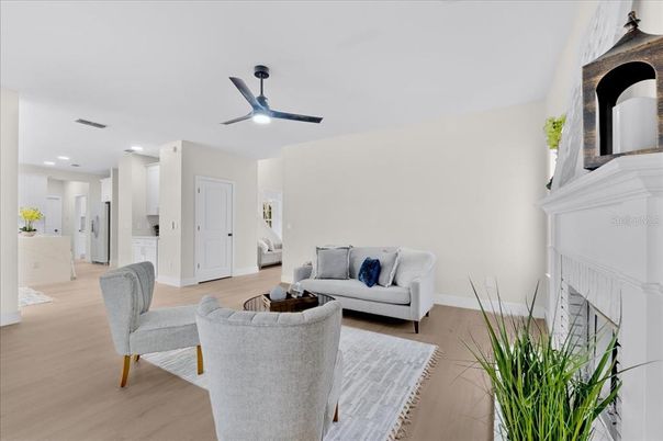Fireplace, Interior, Living room, Recessed Lighting, Wood Texture Flooring