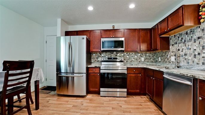 Interior, Kitchen, Recessed Lighting, Stainless Steel Appliances, Wood Texture Flooring