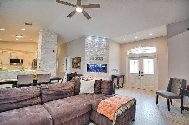Dining room, Interior, Kitchen, Living room, Recessed Lighting, Stone Walls, Wood Texture Flooring