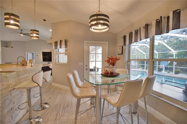 Dining room, Glass Ceilings, Interior, Pendant Lights, Recessed Lighting, Sun Room, Wood Texture Flooring
