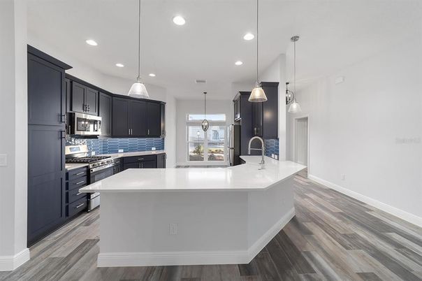 Interior, Kitchen, Pendant Lights, Recessed Lighting, Stainless Steel Appliances, Wood Texture Flooring