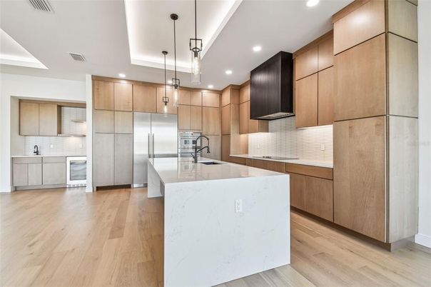 Interior, Kitchen, Pendant Lights, Recessed Lighting, Stainless Steel Appliances, Wood Texture Flooring