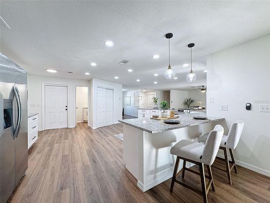 Interior, Kitchen, Pendant Lights, Recessed Lighting, Stainless Steel Appliances, Wood Texture Flooring