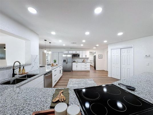 Interior, Kitchen, Pendant Lights, Recessed Lighting, Stainless Steel Appliances, Wood Texture Flooring