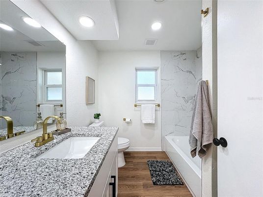 Bathroom, Interior, Marble Walls, Recessed Lighting, Wood Texture Flooring