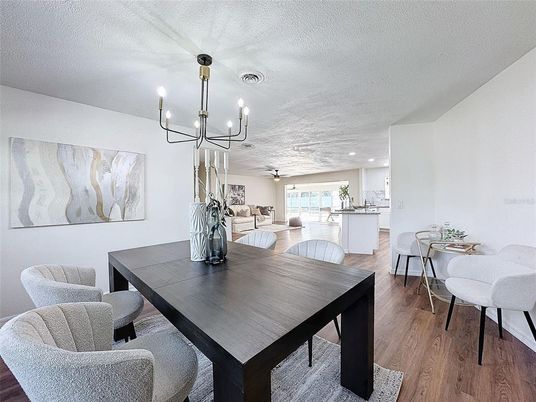 Chandelier, Dining room, Interior, Kitchen, Living room, Recessed Lighting, Wood Texture Flooring