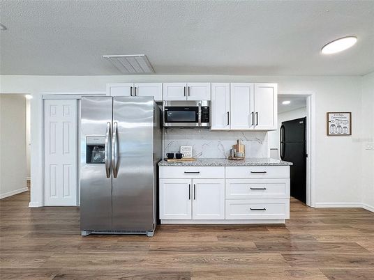 Interior, Kitchen, Recessed Lighting, Stainless Steel Appliances, Wood Texture Flooring
