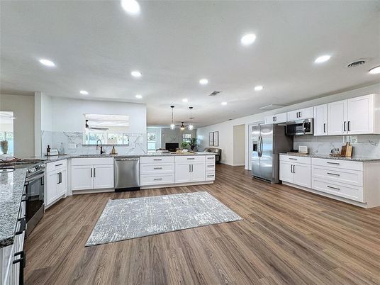 Interior, Kitchen, Pendant Lights, Recessed Lighting, Stainless Steel Appliances, Wood Texture Flooring