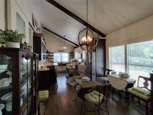 Chandelier, Dining room, Interior, Kitchen, Pendant Lights, Stainless Steel Appliances, Wood Texture Flooring
