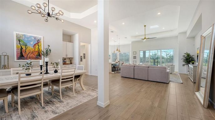 Dining room, Interior, Living room, Pendant Lights, Recessed Lighting, Wood Texture Flooring