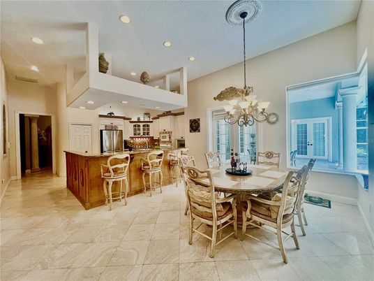 Chandelier, Dining room, Interior, Kitchen, Recessed Lighting, Stainless Steel Appliances