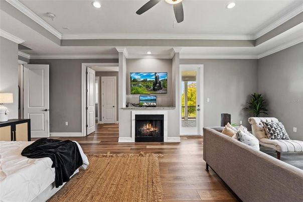 Bedroom, Fireplace, Interior, Recessed Lighting, Wood Texture Flooring