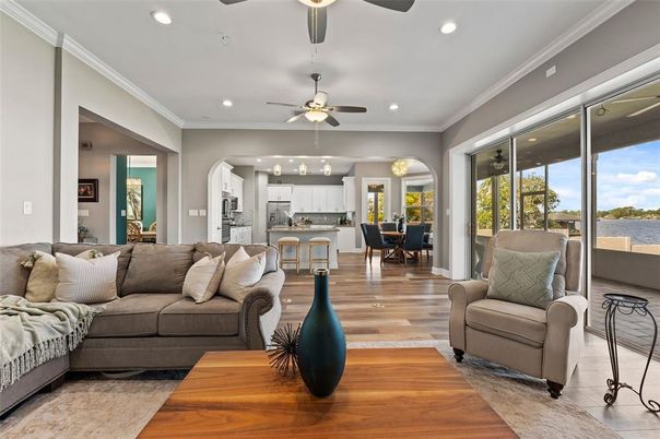 Dining room, Interior, Kitchen, Living room, Recessed Lighting, Stainless Steel Appliances, Water, Wood Texture Flooring