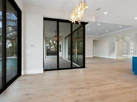 Chandelier, Empty room, Interior, Recessed Lighting, Wood Texture Flooring