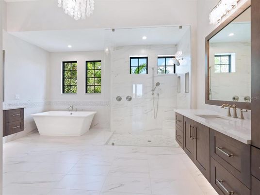Bathroom, Dual Sink Vanities, Free Standing Baths, Glass Shower, Interior, Marble, Marble Walls, Recessed Lighting