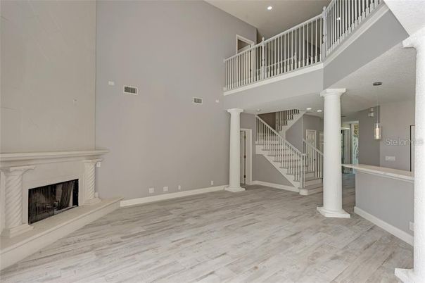 Fireplace, Interior, Pendant Lights, Recessed Lighting, Wood Texture Flooring