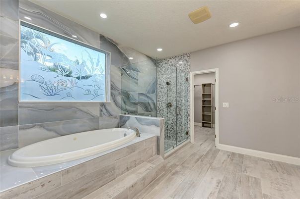 Bathroom, Glass Shower, Interior, Marble Walls, Recessed Lighting, Wood Texture Flooring