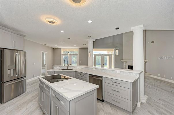 Interior, Kitchen, Pendant Lights, Recessed Lighting, Stainless Steel Appliances, Wood Texture Flooring