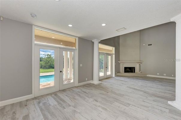 Empty room, Fireplace, Interior, Recessed Lighting, Wood Texture Flooring