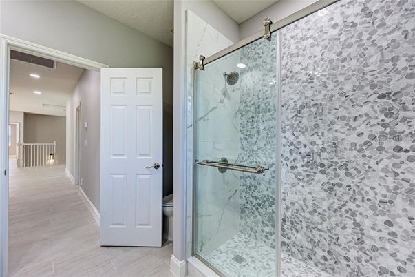 Bathroom, Glass Shower, Interior, Marble Walls, Recessed Lighting, Wood Texture Flooring