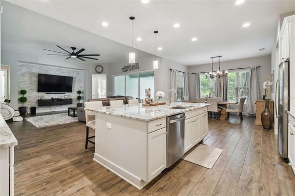 Dining room, Interior, Kitchen, Living room, Pendant Lights, Recessed Lighting, Stainless Steel Appliances, Wood Texture Flooring
