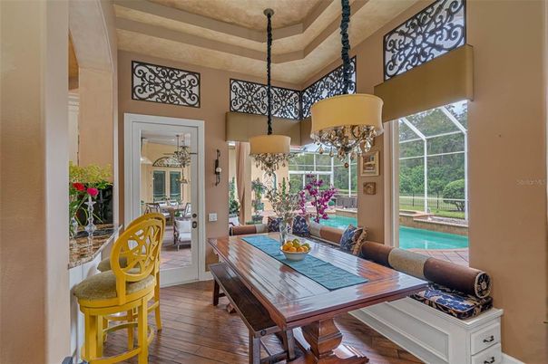 Chandelier, Dining room, Glass Ceilings, Interior, Pendant Lights, Pool, Sun Room, Wood Texture Flooring