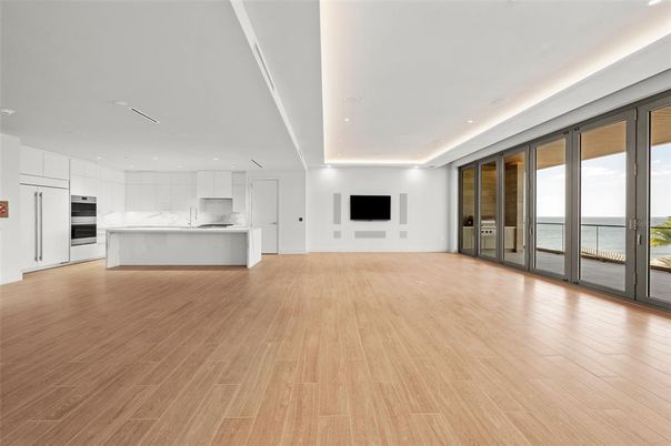 Interior, Kitchen, Marble Walls, Recessed Lighting, Stainless Steel Appliances, Water, Wood Texture Flooring