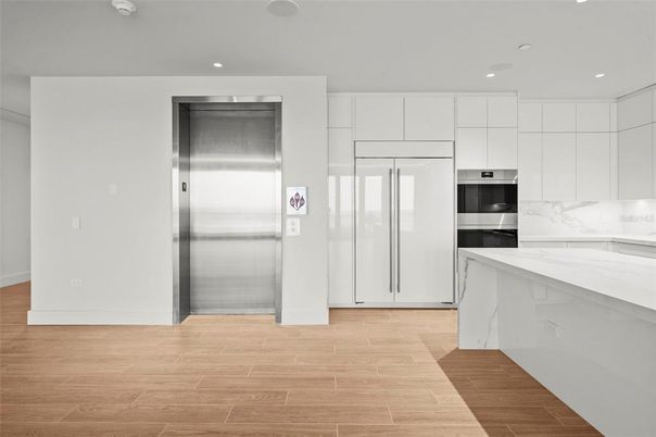 Interior, Kitchen, Recessed Lighting, Stainless Steel Appliances, Wood Texture Flooring